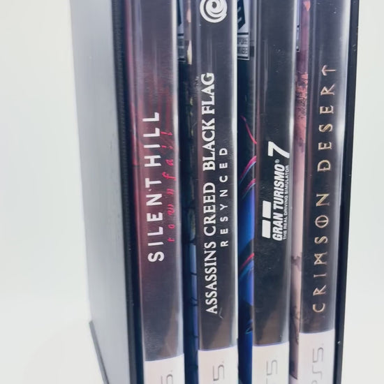 Original rotation video of the black four-slot PS5 game case holder with four cases stored horizontally.
