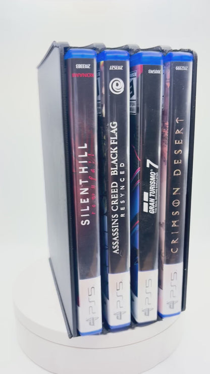 Original rotation video of the black four-slot PS5 game case holder with four cases stored horizontally.